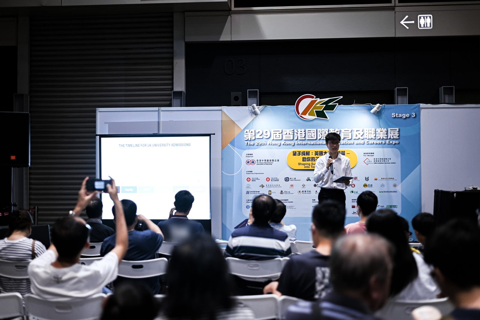 A Flintstrike adviser presenting the UK university admissions timeline to a seated audience at the Hong Kong International Education and Careers Expo.